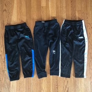Bundle of boys Puma black pants, size 5 and 6